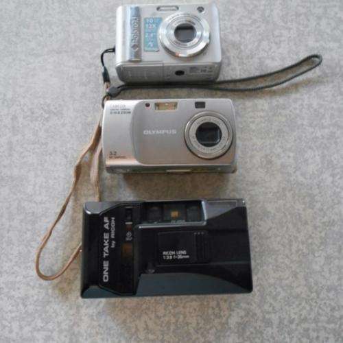 2 X DIGITAL CAMERAS / POLAROID AND OLYMPUS - 1 X RICOH FILM CAMERA ( R120.00 FOR ALL THREE )